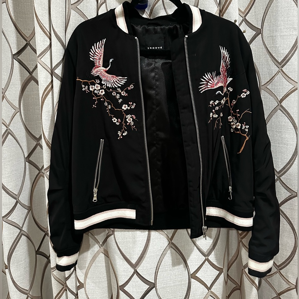 It’s a Trouvé Embroidered Bomber Jacket, medium